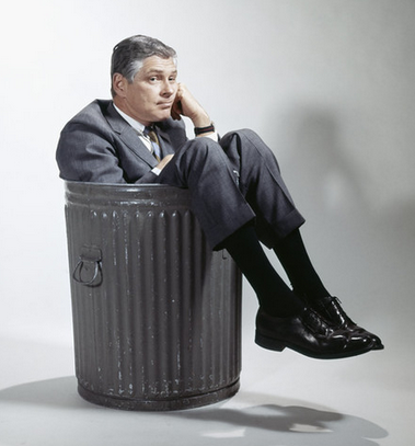 sitting in a trash can.PNG
