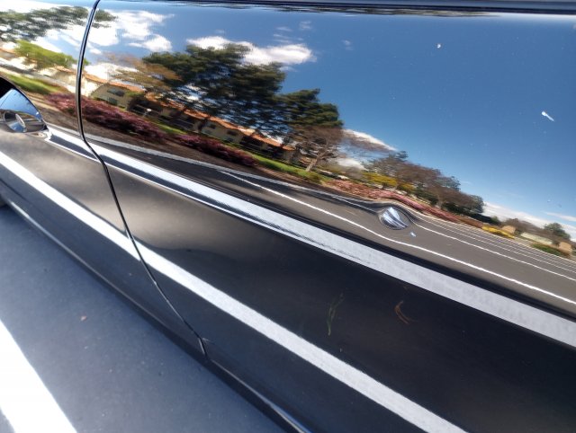 door ding with white paint.jpg